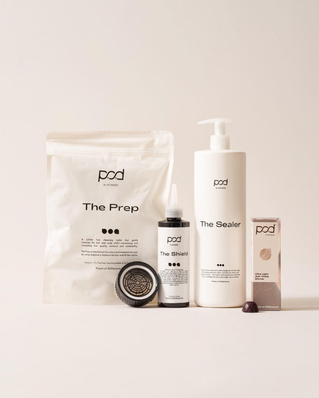Collection of 'pod' skincare products on a light background