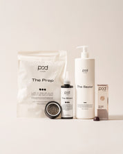 Collection of 'pod' skincare products on a light background